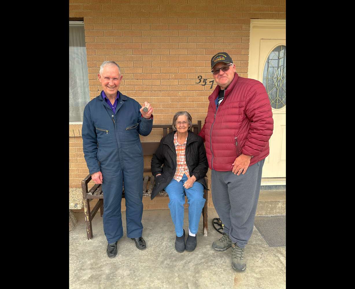 Louis Haynes, right, with Errol Burns, left, who is 87 years old, and his sister Ellen Burns-Galley, who is 90 years old, the grandchildren of Rebecca Fannie Burns, who long ago traveled to France to visit the final resting place of Private Hubert Hyrum Burns, her eldest son.