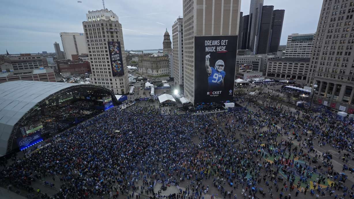 Crowds watch during the second round of the NFL football draft, Friday, April 26, 2024, in Detroit.