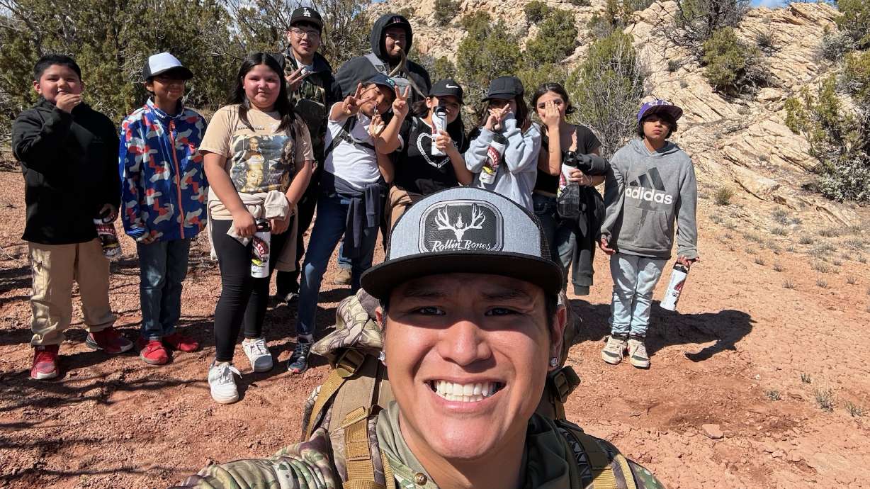 Shaun Ketchum, foreground, on a hike earlier this spring with Native American youth on the Bears Ears area trail that a contingent of Paiute and Ute Indians used in 1923 while fleeing an outbreak of violence.