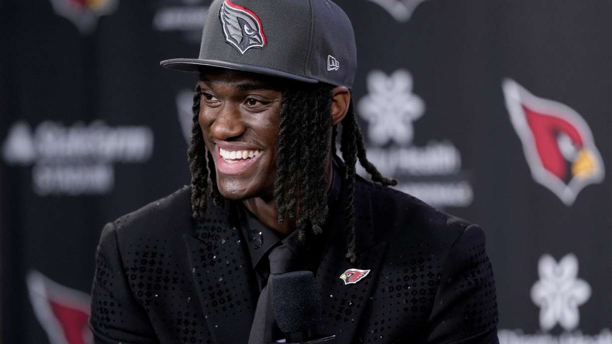 Arizona Cardinals first round draft pick Marvin Harrison Jr. speaks at an NFL football press conference, Friday, April 26, 2024, at the teams' facility in Tempe, Ariz.
