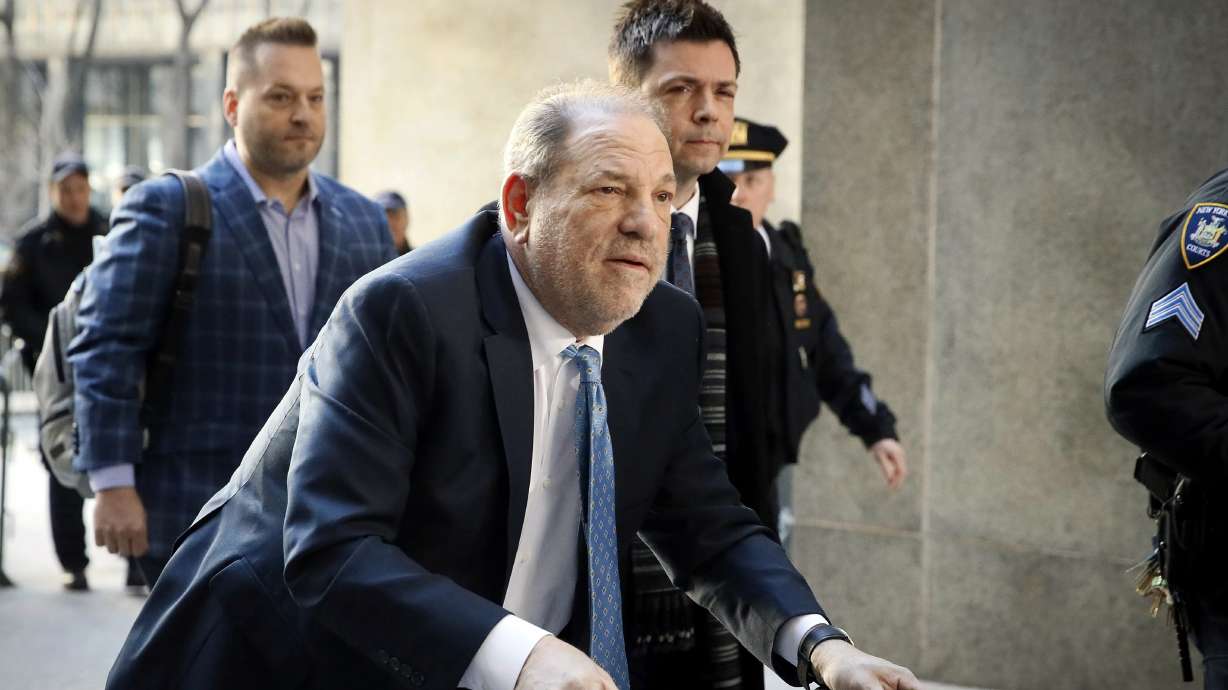 Harvey Weinstein arrives at a Manhattan courthouse as jury deliberations continue in his rape trial in New York, on Feb. 24, 2020. Weinstein's lawyer said Saturday that the onetime movie mogul has been hospitalized.