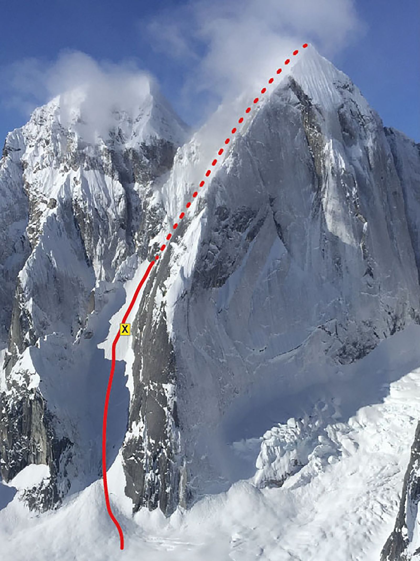 This photo shows the "Escalator" route on Mt. Johnson, Denali National Park and Preserve. The X indicates the approximate location of the rescue of the surviving climber.
