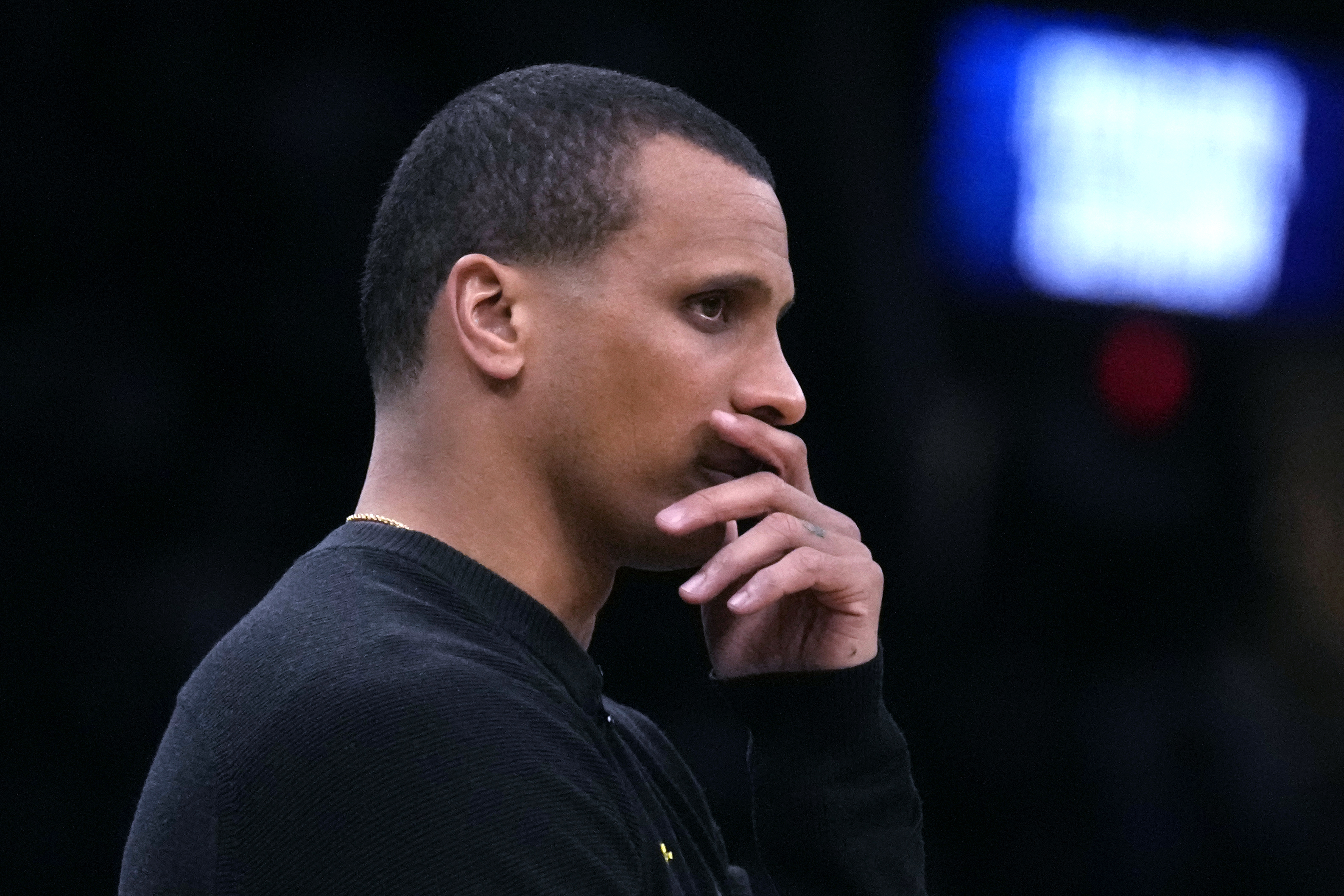 Boston Celtics head coach Joe Mazzulla watches play during the first half of Game 2 of an NBA basketball first-round playoff series against the Miami Heat, Wednesday, April 24, 2024, in Boston.