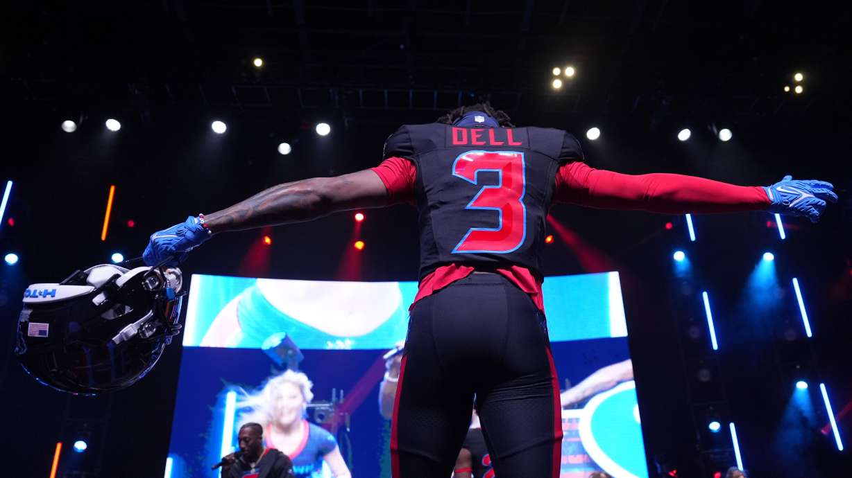 Houston Texans wide receiver Tank Dell wears a new uniform during an NFL football uniform release party Tuesday, April 23, 2024, in Houston.