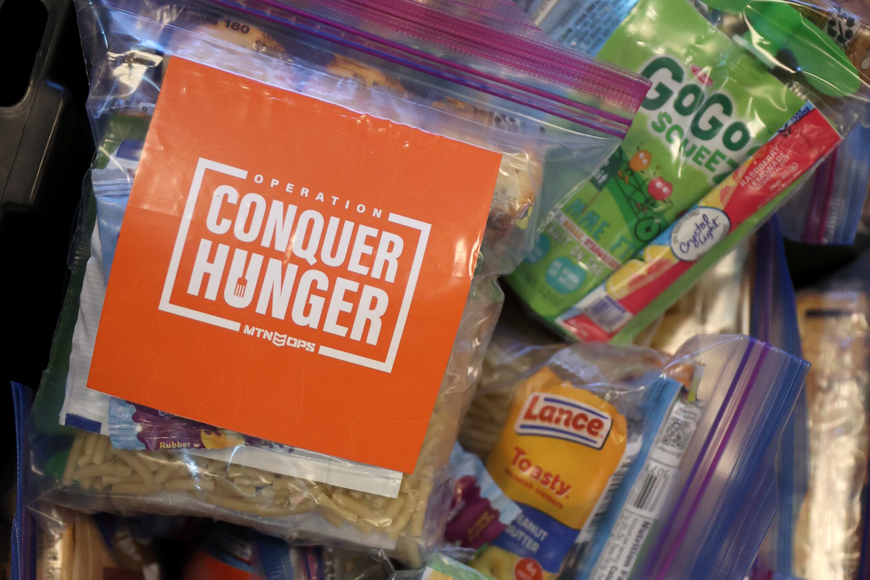 Meal kits are stacked at MTN OPS in Fruit Heights on April 16. The company has donated millions of meals to those in need through Operation Conquer Hunger.