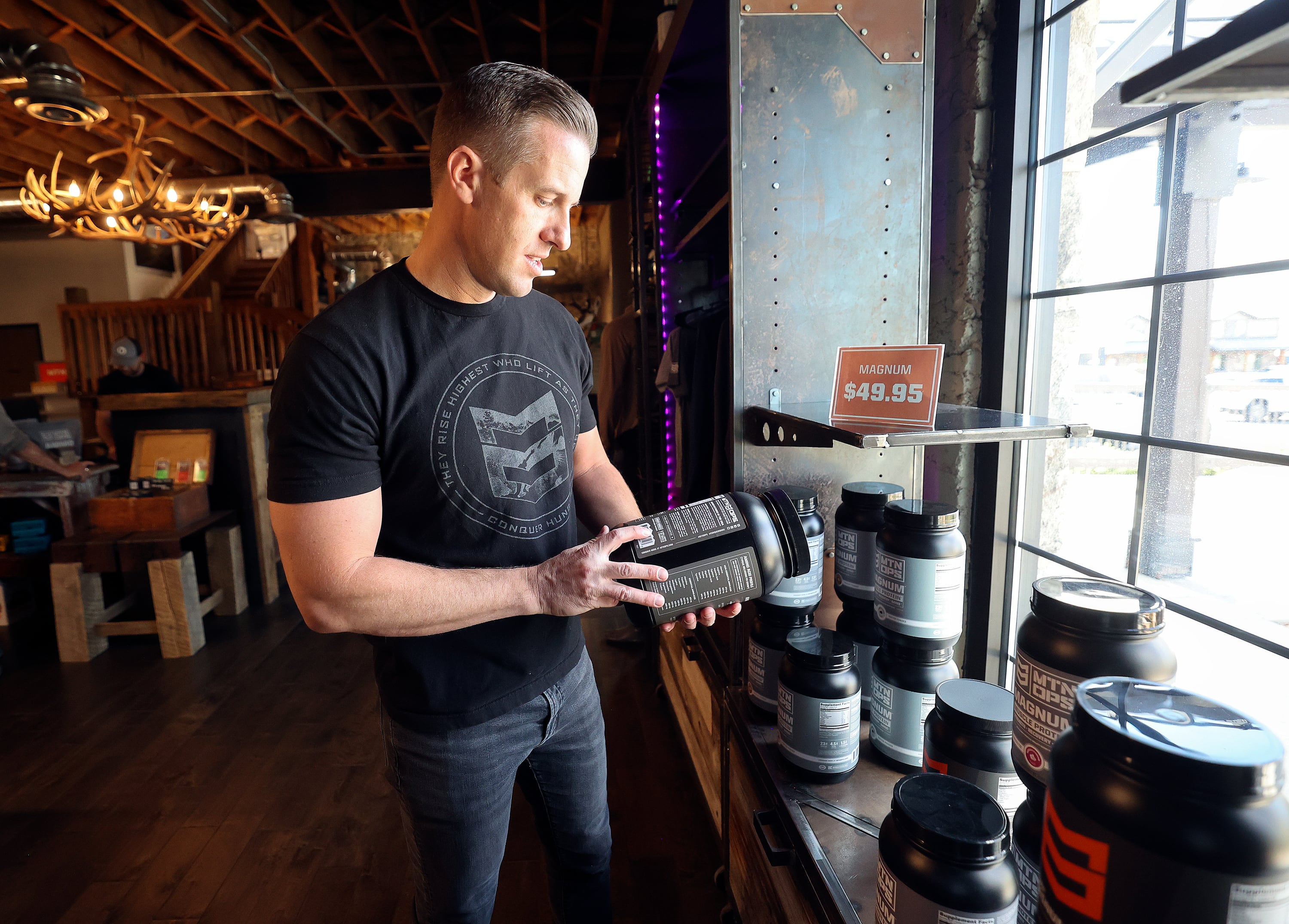 Trevor Farnes, MTN OPS co-founder and CEO, shows MTN OPS products at the company location in Fruit Heights on April 16.