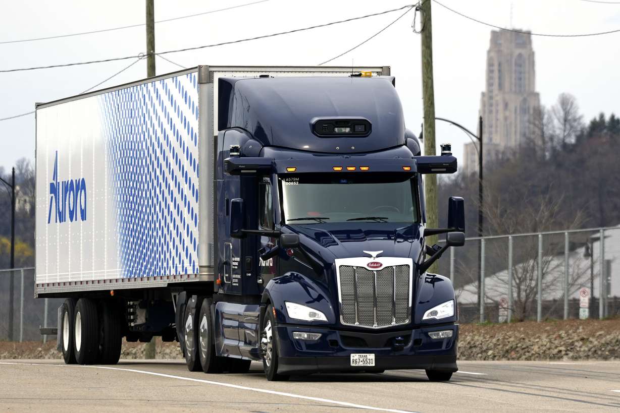 A self-driving tractor trailer maneuvers around a test track in Pittsburgh, March 14. The truck is owned by Pittsburgh-based Aurora Innovation Inc.