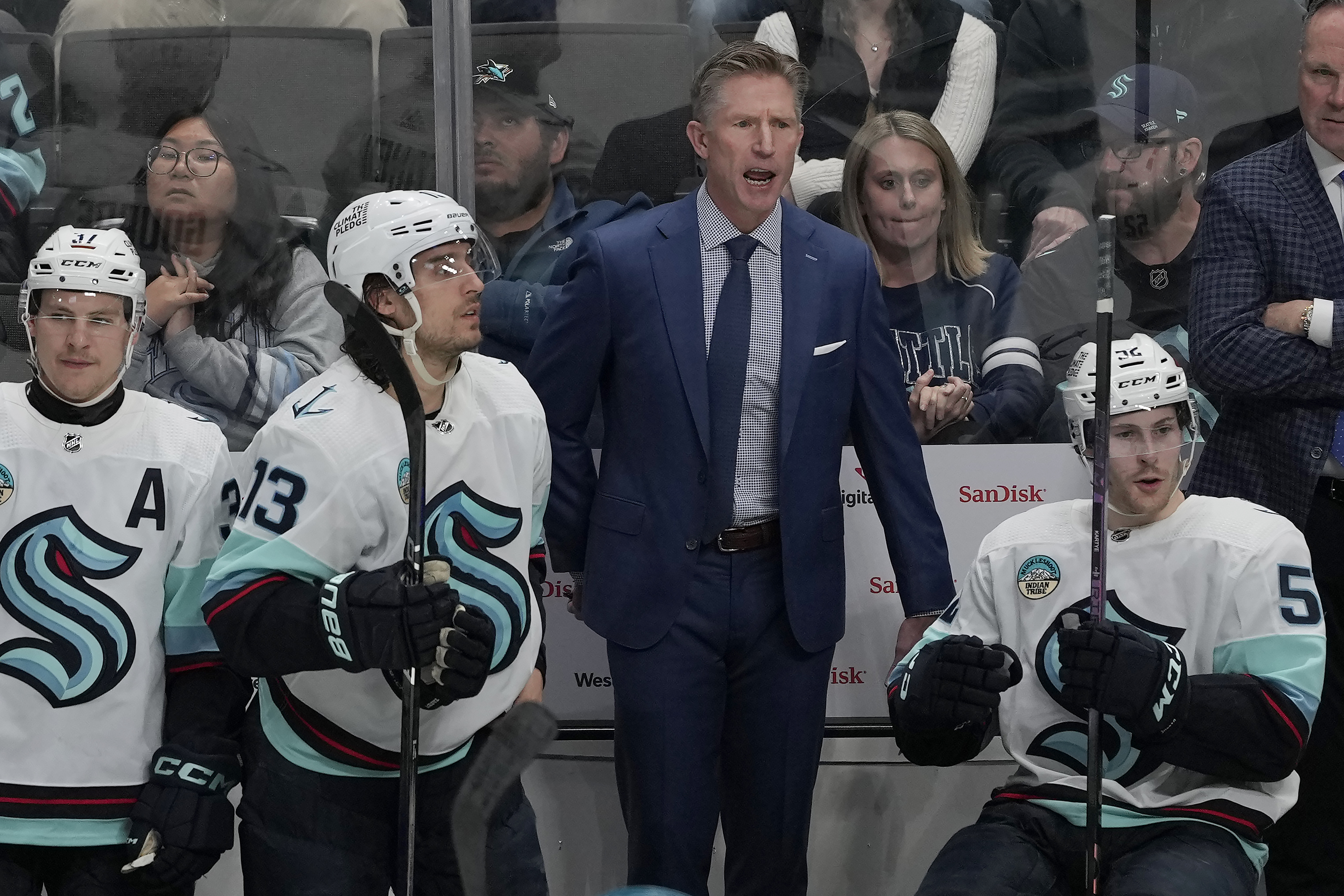 Seattle Kraken head coach Dave Hakstol reacts toward players during the third period of the team's NHL hockey game against the San Jose Sharks in San Jose, Calif., Monday, April 1, 2024.