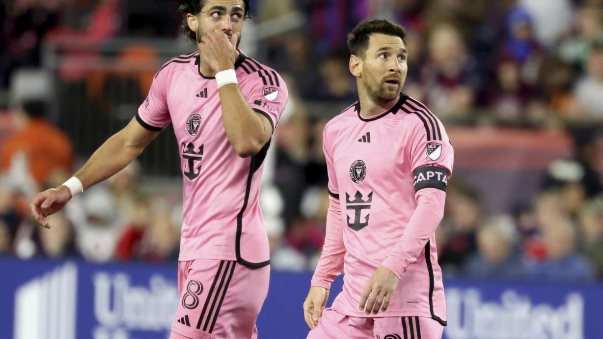 Inter Miami forwards Leonardo Campana (8) and Lionel Messi (10) watch the replay of Messi's goal in the first half of an MLS soccer match against the New England Revolution, Saturday, April 27, 2024, in Foxborough, Mass.