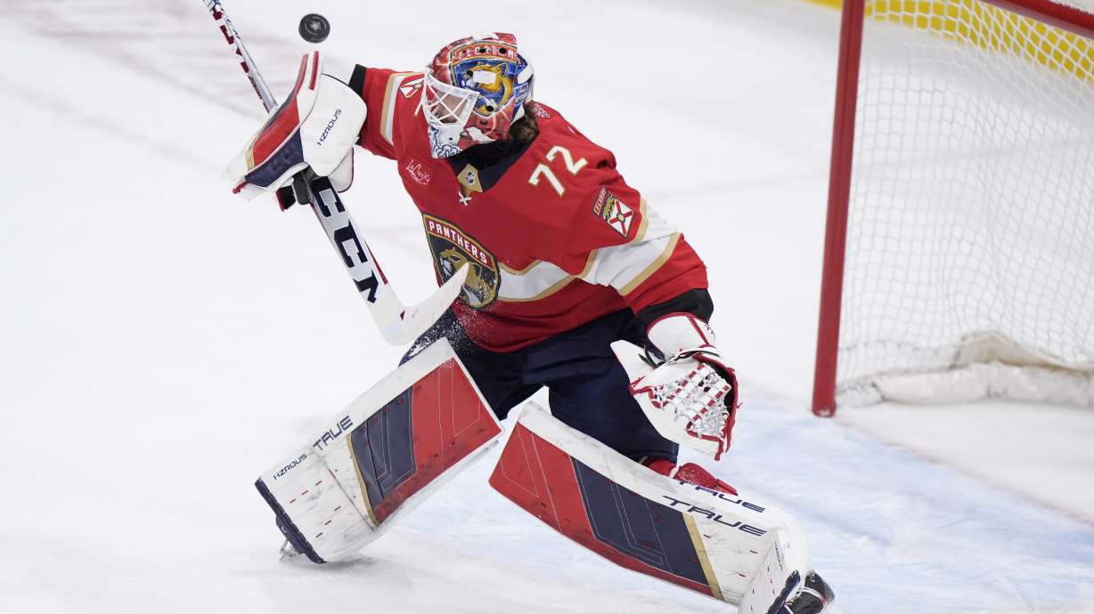Florida Panthers goaltender Sergei Bobrovsky deflects a shot during the first period of Game 5 of the first-round of an NHL Stanley Cup Playoff series against the Tampa Bay Lightning, Monday, April 29, 2024, in Sunrise, Fla.