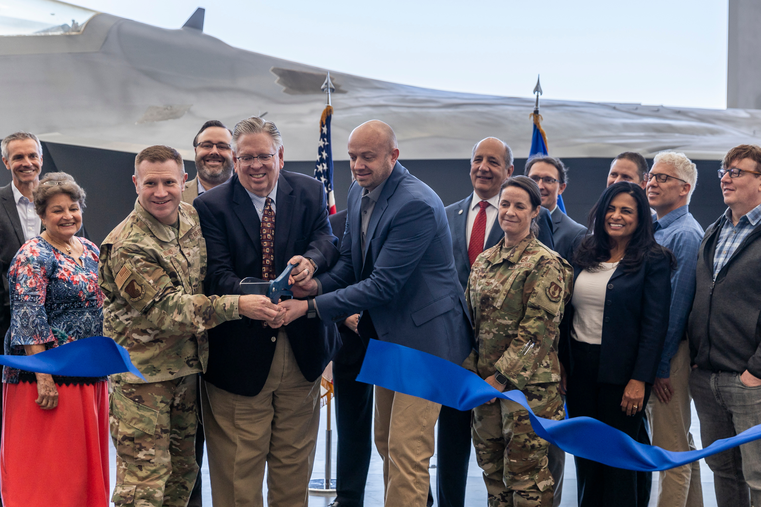 A ribbon is cut during a ceremony unveiling the Alexander Hall and the L.S. Skaggs Gallery, a 10-year-long project at the Hill Aerospace Museum in Hill Air Force Base on Monday.