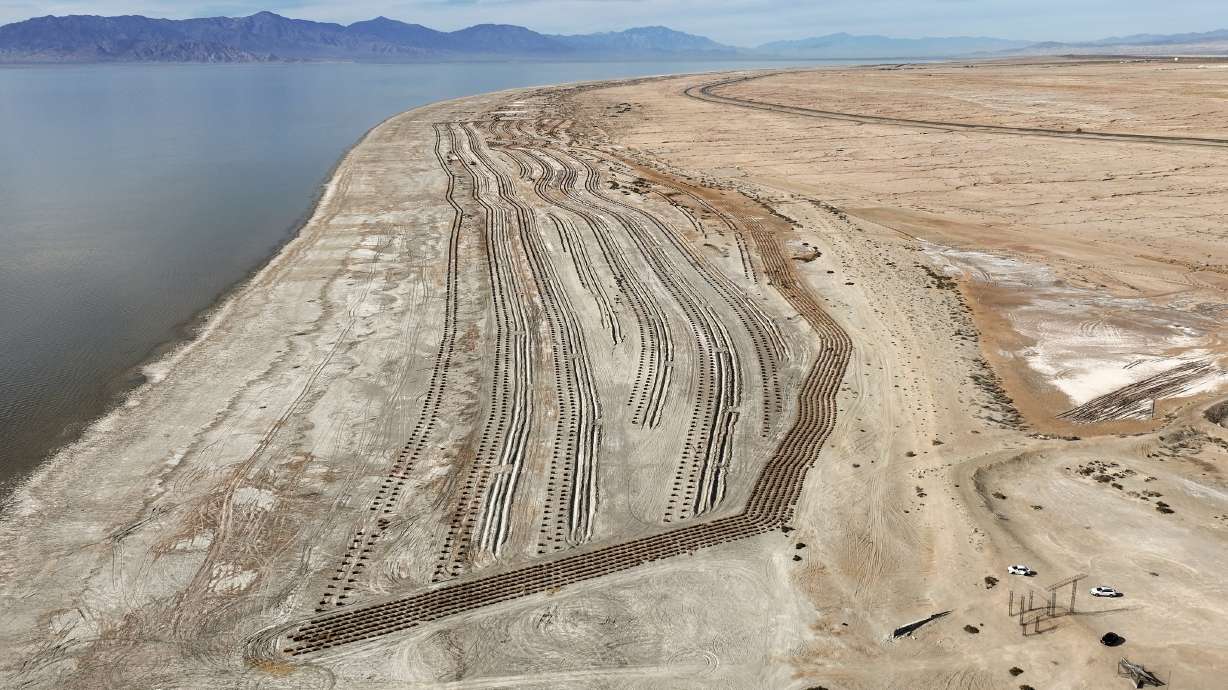 Hay bales used for dust mitigation in a Salton Sea Management Program project are pictured on approximately 68 acres near Bombay Beach, Calif., on Dec. 11, 2023. Utah natural resources officials toured the lake earlier this month as they look for lessons to apply to the Great Salt Lake.