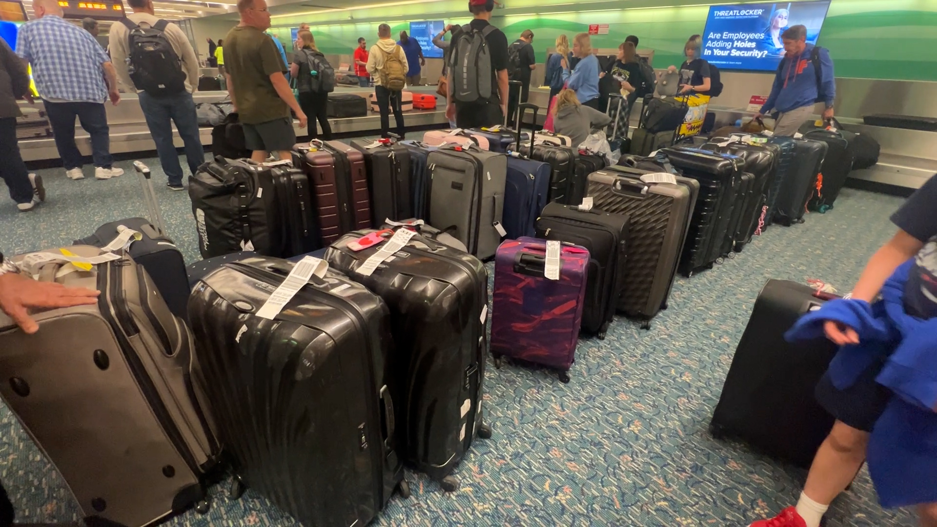 The baggage claim area was packed at Orlando International Airport with spring break travelers. The Gephardt family waited a half-hour for his family’s first piece of luggage to appear on the carousel.