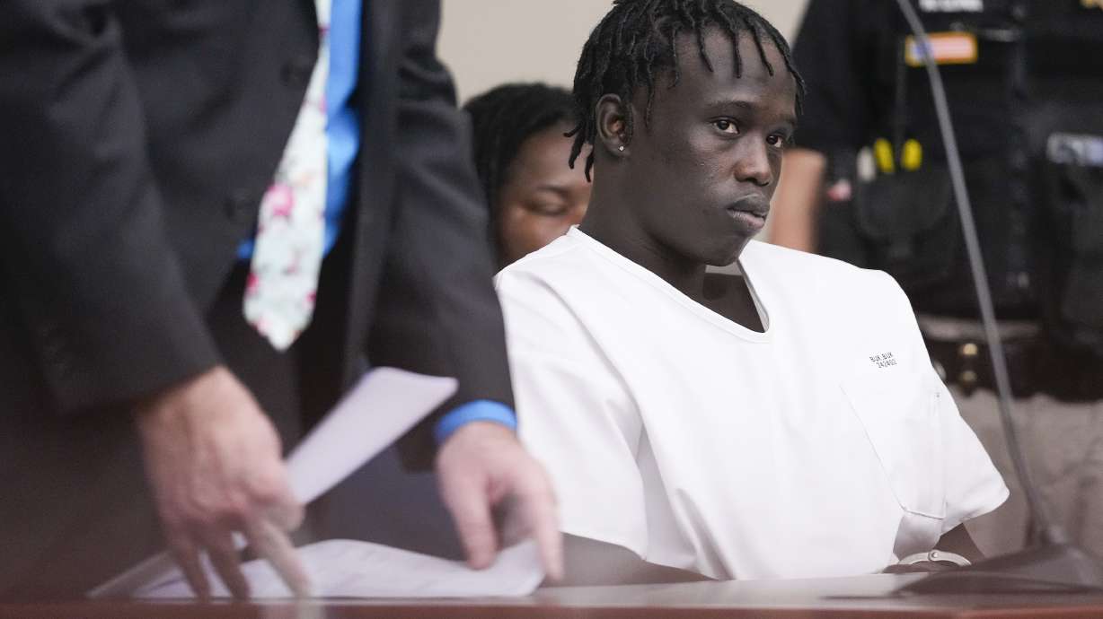 Buk Mawut Buk appears at the sentencing for the murder of University of Utah football player Aaron Lowe in the 3rd District Court in Salt Lake City on Monday. Buk was ordered Monday to serve at least 18 years and up to life in prison.