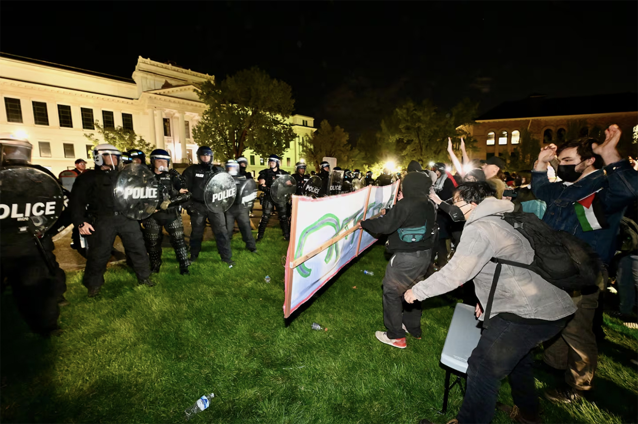 Police break up the demonstrators gathered at the University of Utah to show support for Palestine in Salt Lake City on Monday.