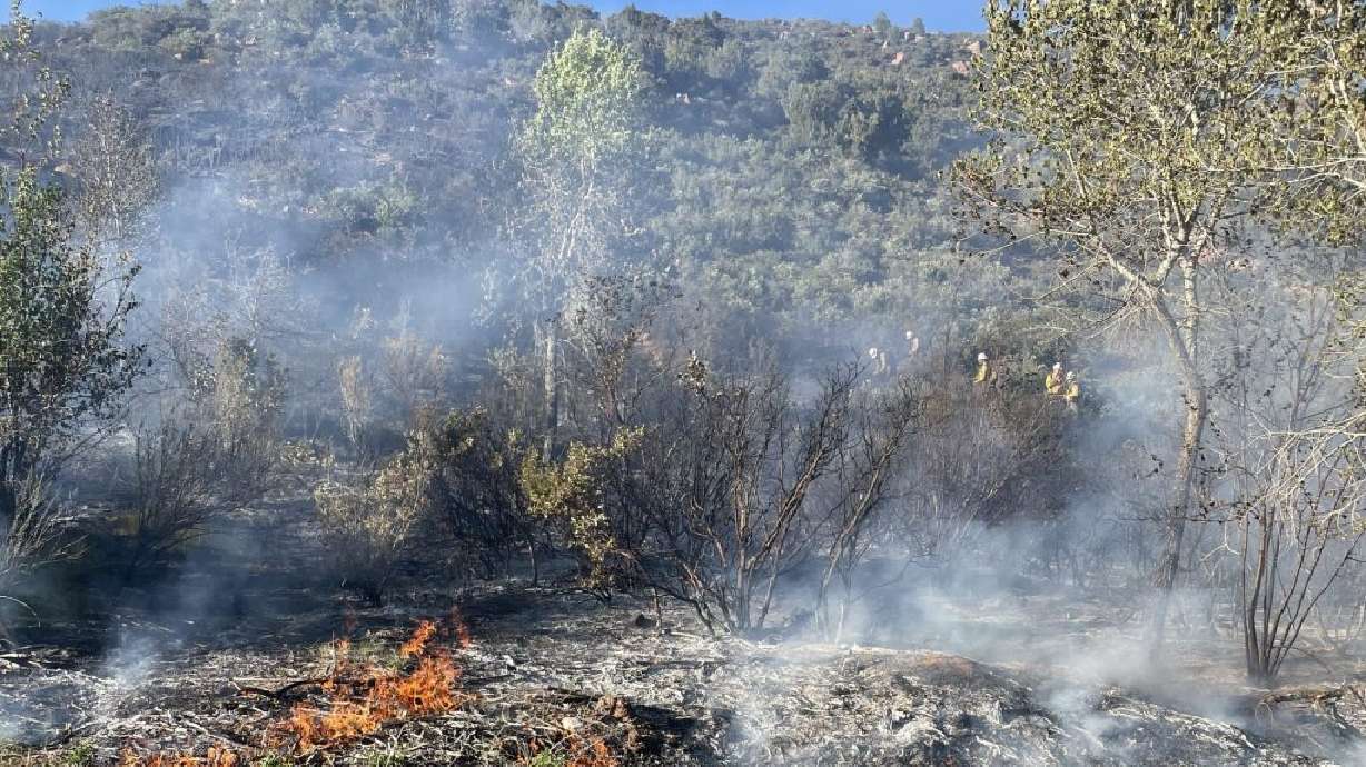 A fire burning near the Oak Grove Campground spread from 5 to 22 acres over the course of a few hours in Washington County on Monday.
