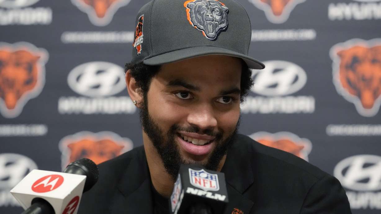 Chicago Bears No. 1 draft pick quarterback Caleb Williams listens to reporters during an NFL football news conference in Lake Forest, Ill., Friday, April 26, 2024.