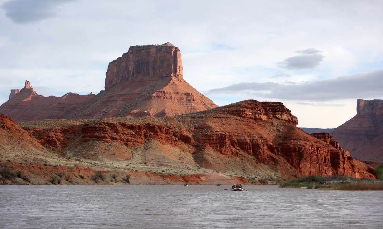 Journalists and water experts raft down the Moab Daily section of the Colorado River with Holiday River Expeditions during a kickoff event for the Colorado River Collaborative in Grand County on Thursday.
