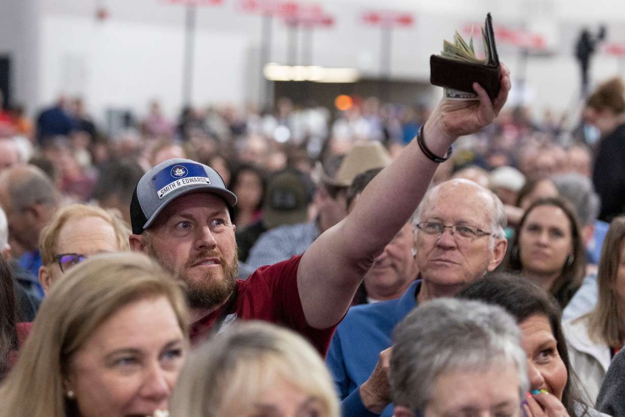 An attendee jeers Utah's 1st Congressional District candidate Rep. Blake Moore, R-Utah, during the Utah Republican Party convention at the Salt Palace Convention Center in Salt Lake City on Saturday.
