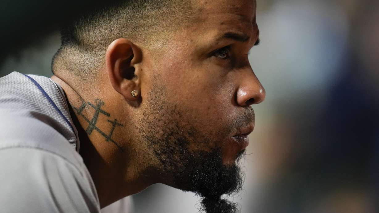 Houston Astros' José Abreu watches from the dugout during the eighth inning of a baseball game against the Chicago Cubs, Tuesday, April 23, 2024, in Chicago.