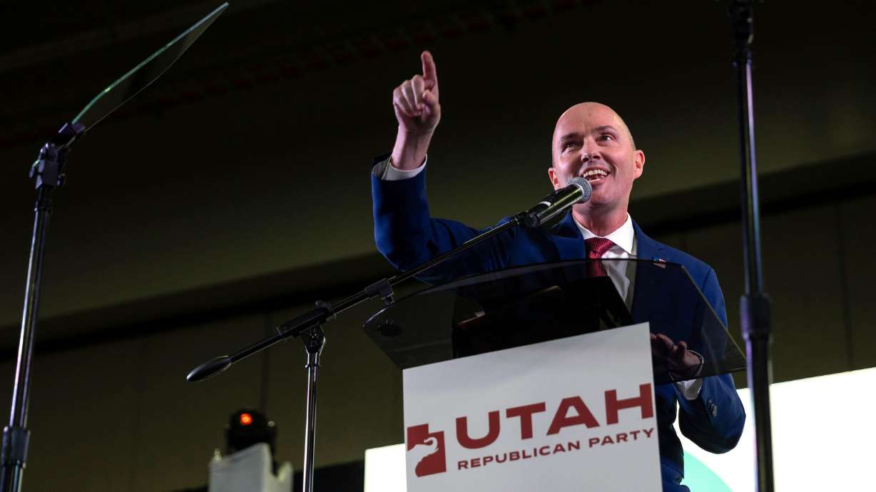 Utah Gov. Spencer J. Cox, who is running for reelection, speaks during the Utah Republican Party state nominating convention in Salt Lake City on April 27. Dozens of county commissioners endorsed Cox for reelection Tuesday.