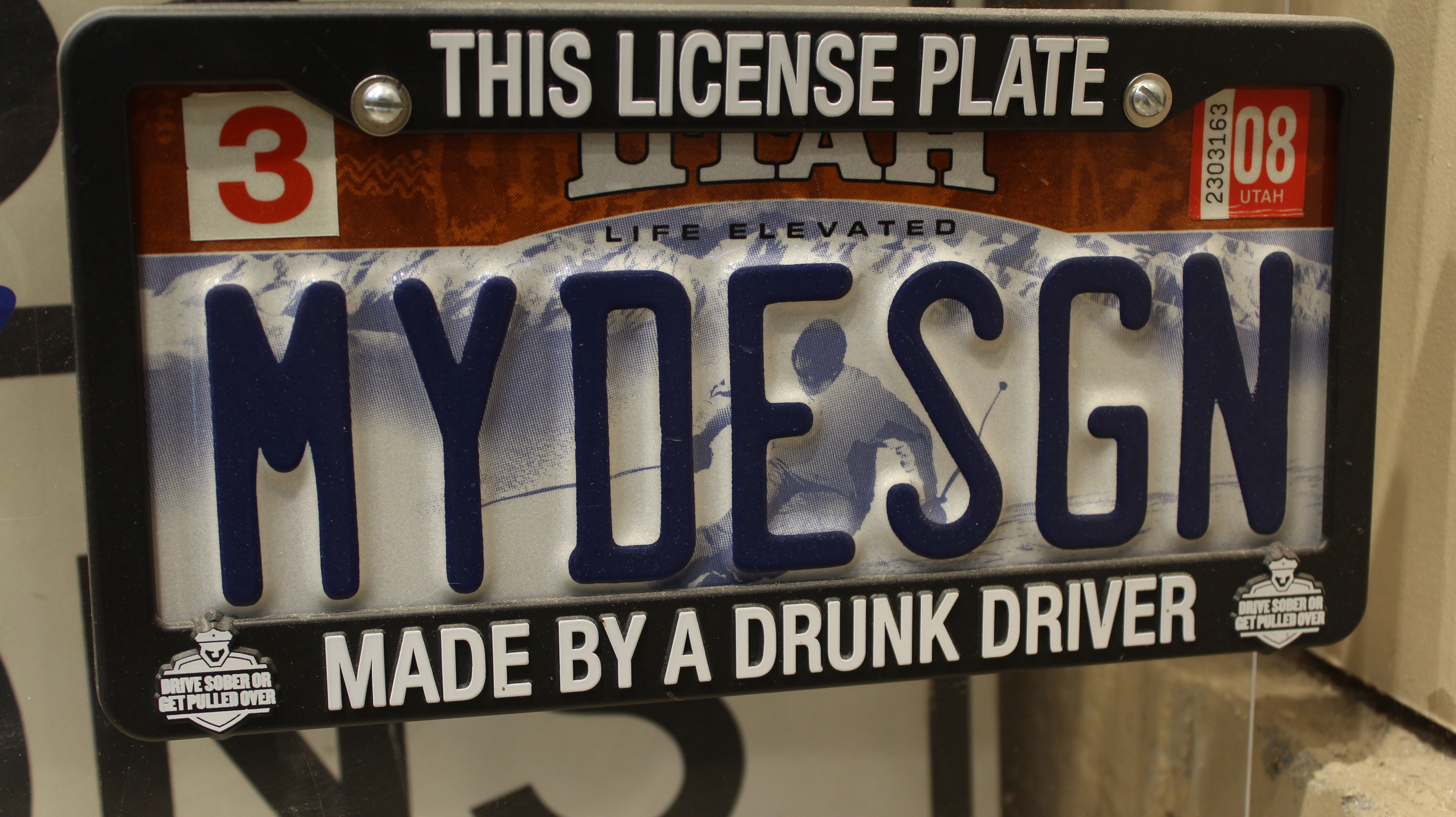 John Clark chose the lettering on the Utah "Life Elevated" license plate that he designed.