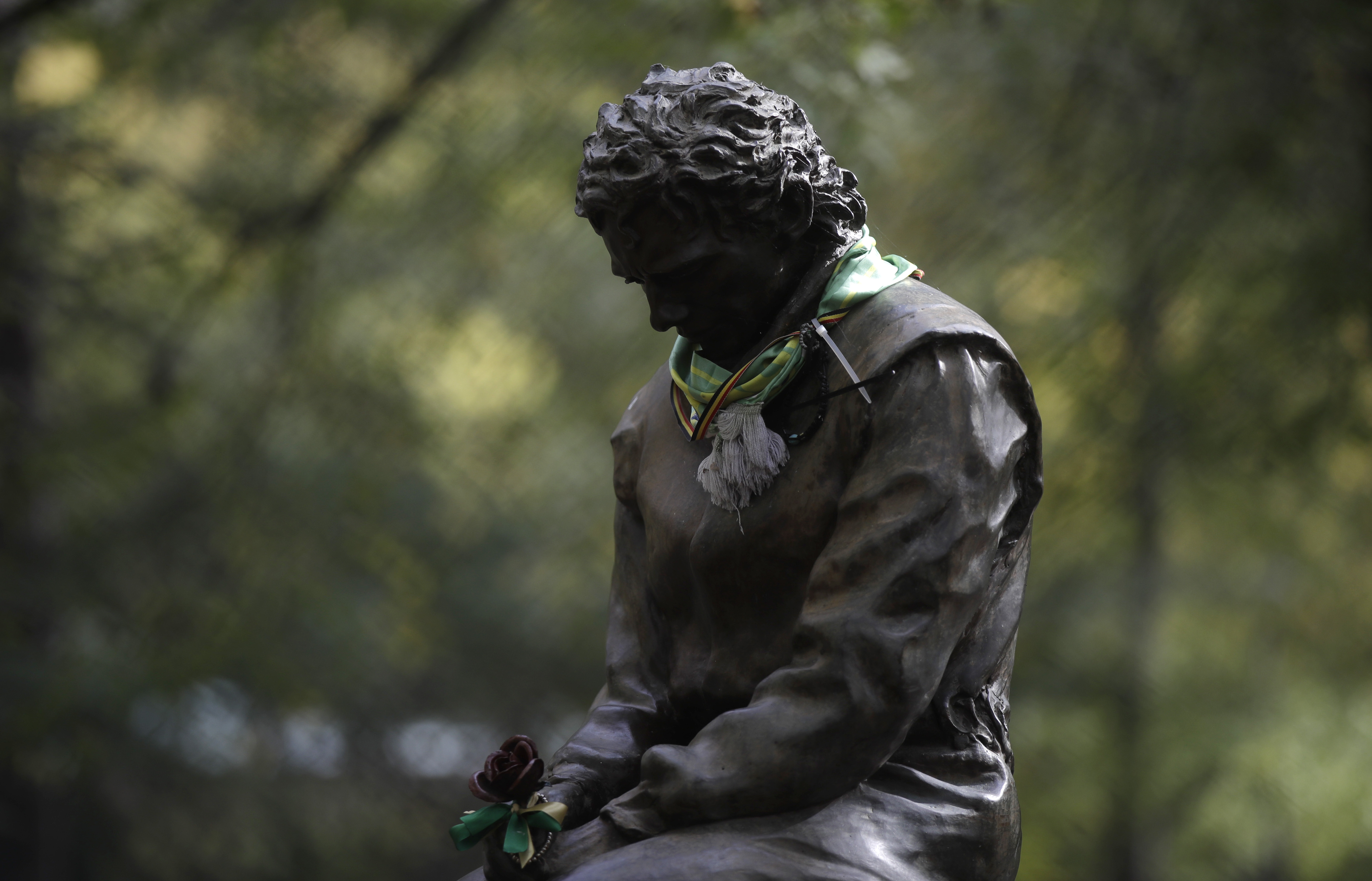 FILE - A scarf has been placed on a statue of Brazilian race car driver Ayrton Senna ahead of Sunday's Emilia Romagna Formula One Grand Prix, at the Dino and Enzo Ferrari racetrack, in Imola, Italy, Friday, Oct. 30, 2020. The 30th anniversary of Ayrton Senna’s death is commemorated on Wednesday, May 1, 2024, with a memorial on the Imola track where he crashed during the 1994 San Marino Grand Prix.