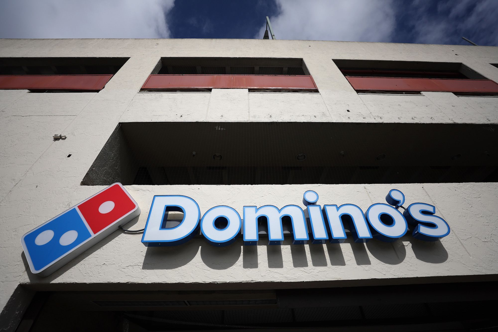 Domino's is tapping into tipping culture frustration to add sales and compete for delivery drivers.