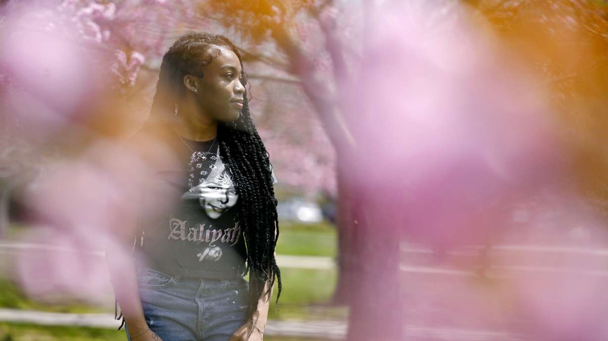 Ashnaelle Bijoux poses on campus Saturday at Norwich Free Academy in Norwich, Conn. Bijoux, a senior at NFA, has been unable to complete the FAFSA form due to a glitch with the form. Without the form and the financial aid it brings, she won't be able to pursue her goal of going to Southern Connecticut State University to become a therapist.