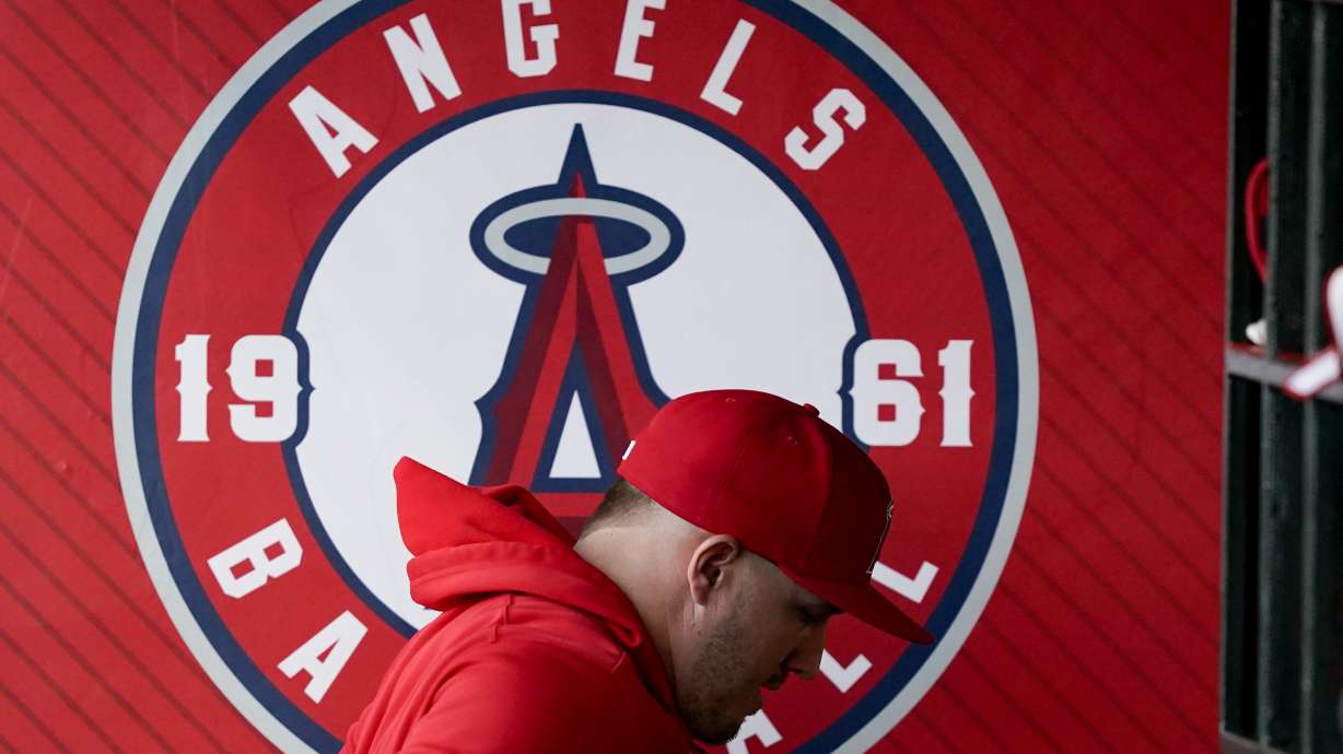 Los Angeles Angels center fielder Mike Trout leaves the dugout before a baseball game against the Philadelphia Phillies, Tuesday, April 30, 2024, in Anaheim, Calif.