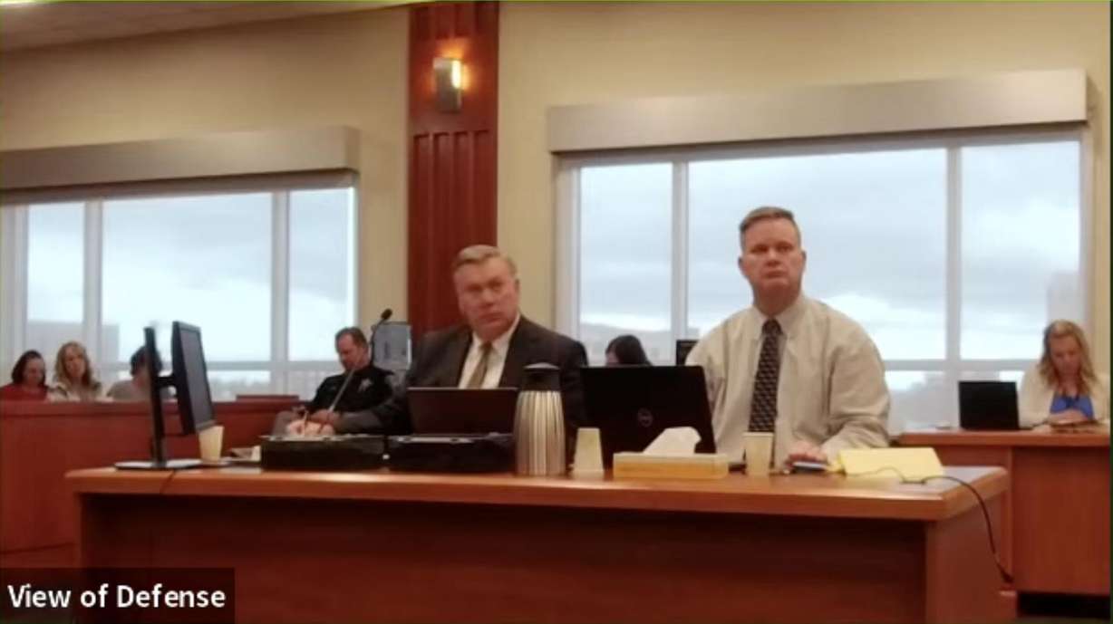 Chad Daybell and his attorney, John Prior, look at a medical examiner as he testifies during Chad Daybell's jury trial on Wednesday.