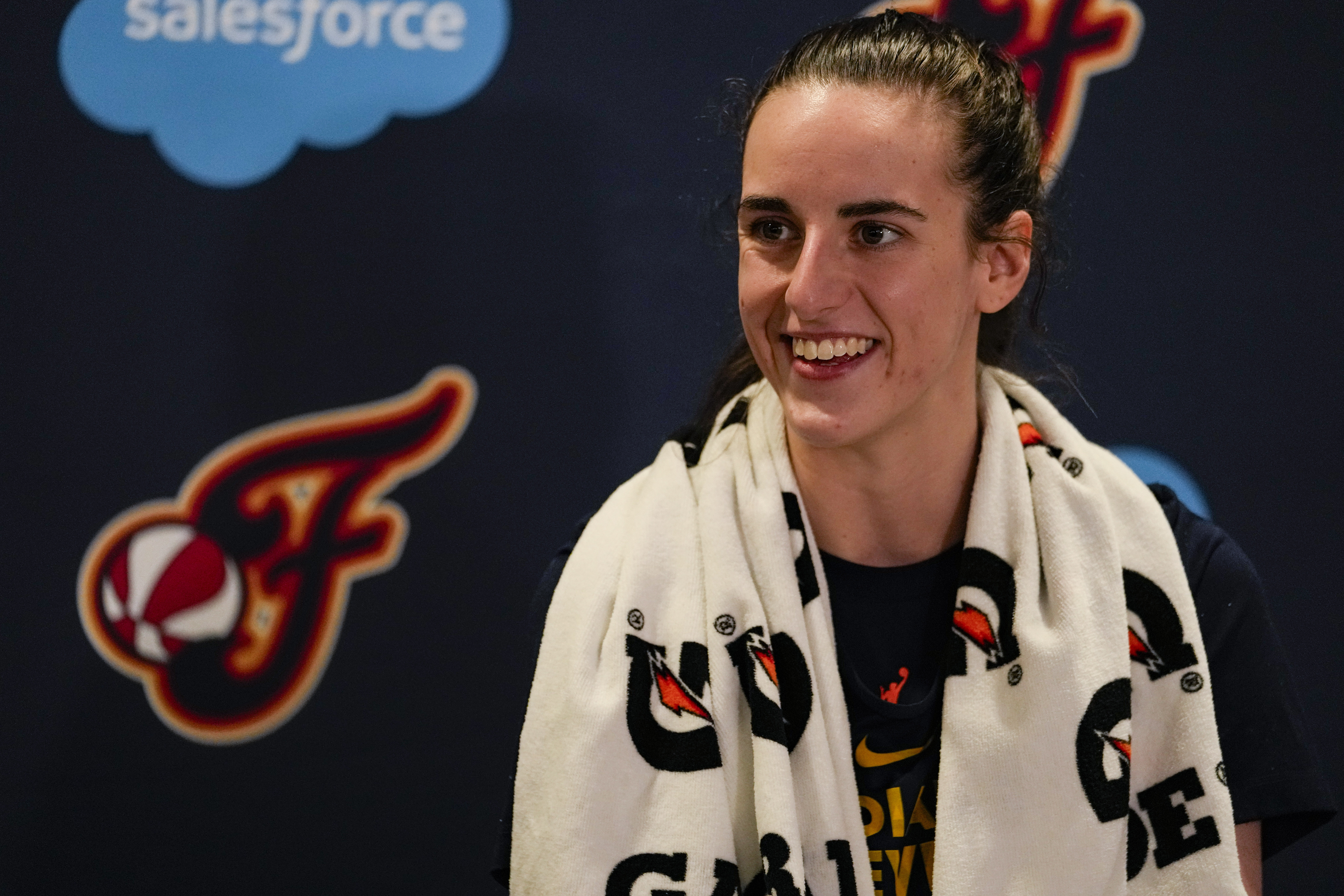 Indiana Fever guard Caitlin Clark speaks with the media after the WNBA basketball team practiced in Indianapolis, Sunday, April 28, 2024.
