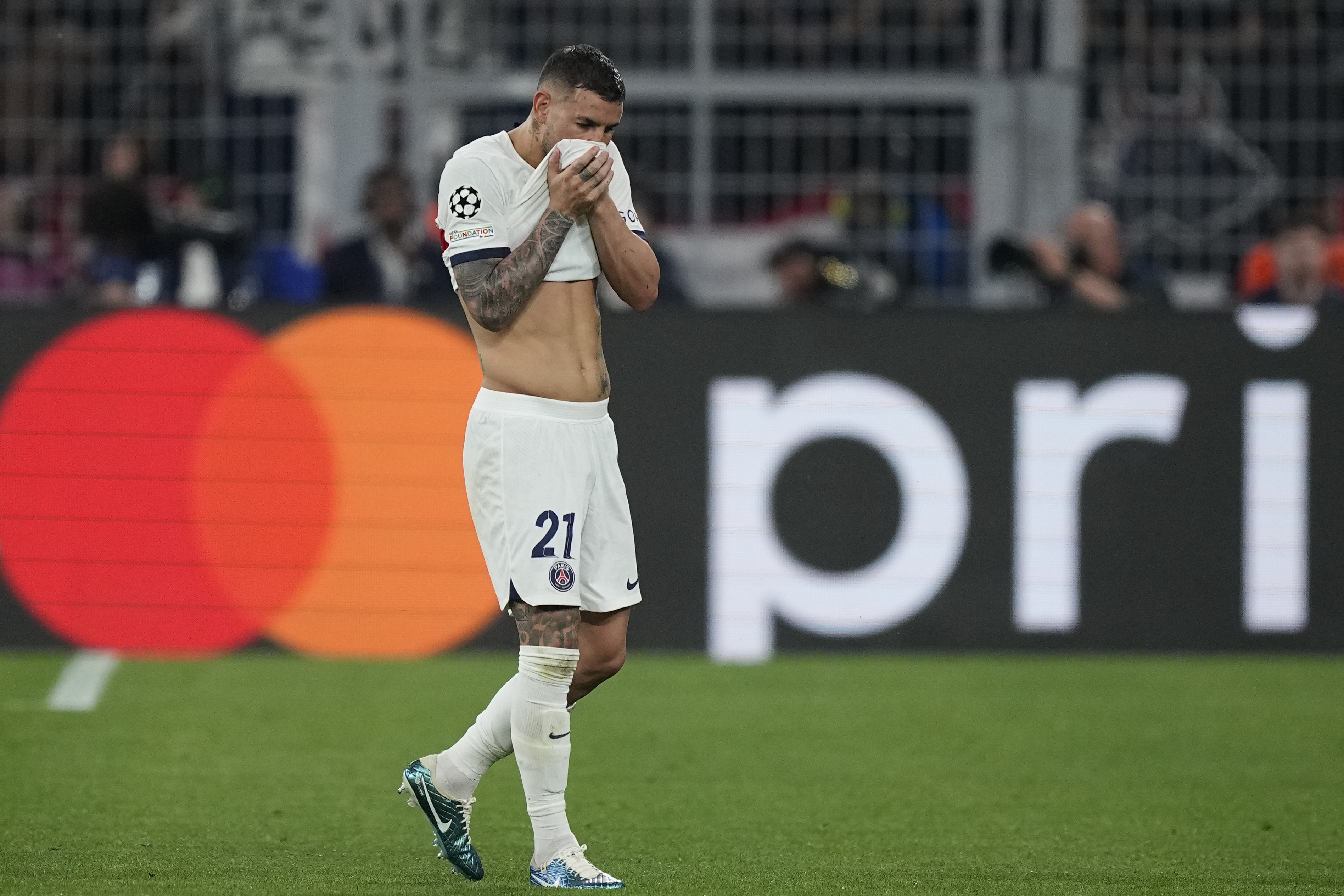 PSG's Lucas Hernandez leaves the pitch after being injured during the Champions League semifinal first leg soccer match between Borussia Dortmund and Paris Saint-Germain at the Signal-Iduna Park in Dortmund, Germany, Wednesday, May 1, 2024. 