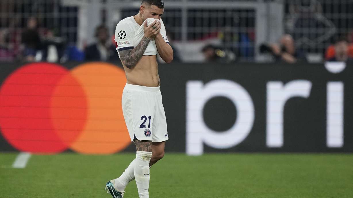 PSG's Lucas Hernandez leaves the pitch after being injured during the Champions League semifinal first leg soccer match between Borussia Dortmund and Paris Saint-Germain at the Signal-Iduna Park in Dortmund, Germany, Wednesday, May 1, 2024.