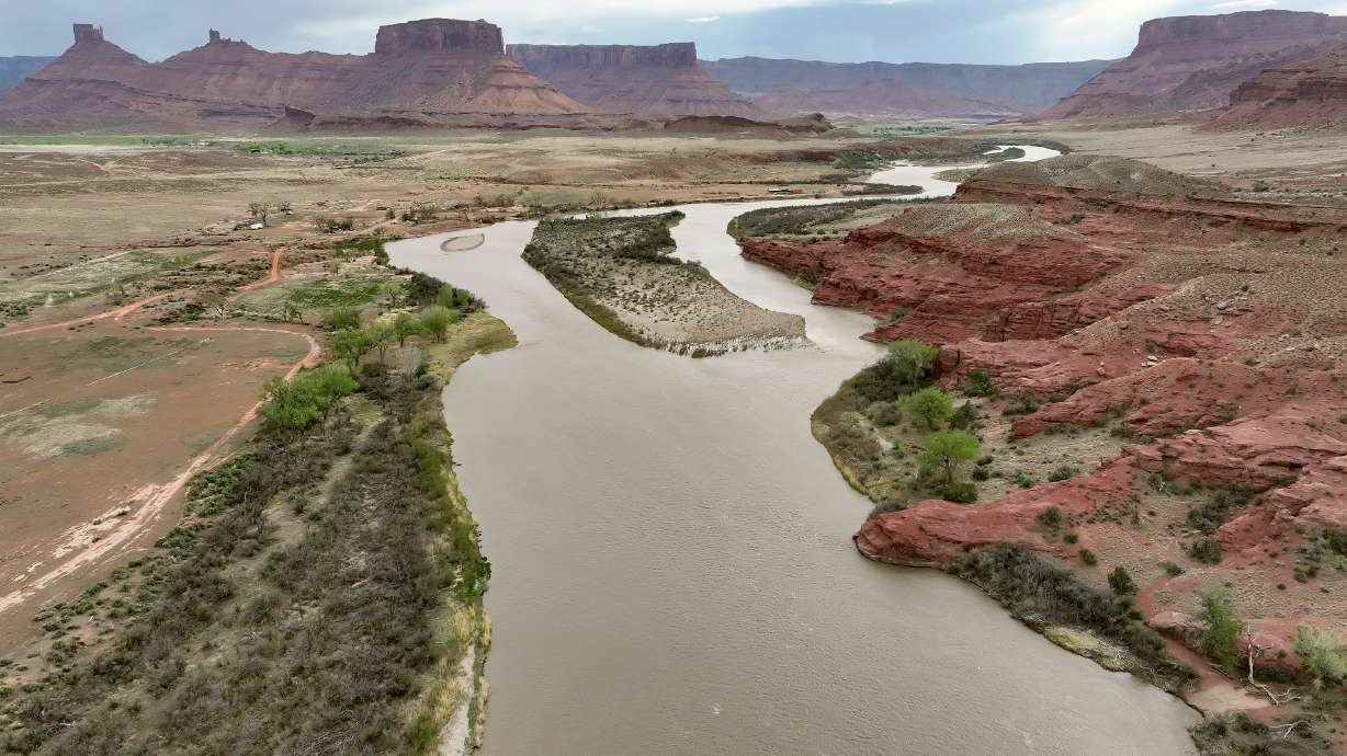 Water flows through the Colorado River Moab Daily in Grand County on April 25. The Upper and Lower basin states are split on a long-term plan to manage Lake Powell and Lake Mead, and meetings will pick up this month.