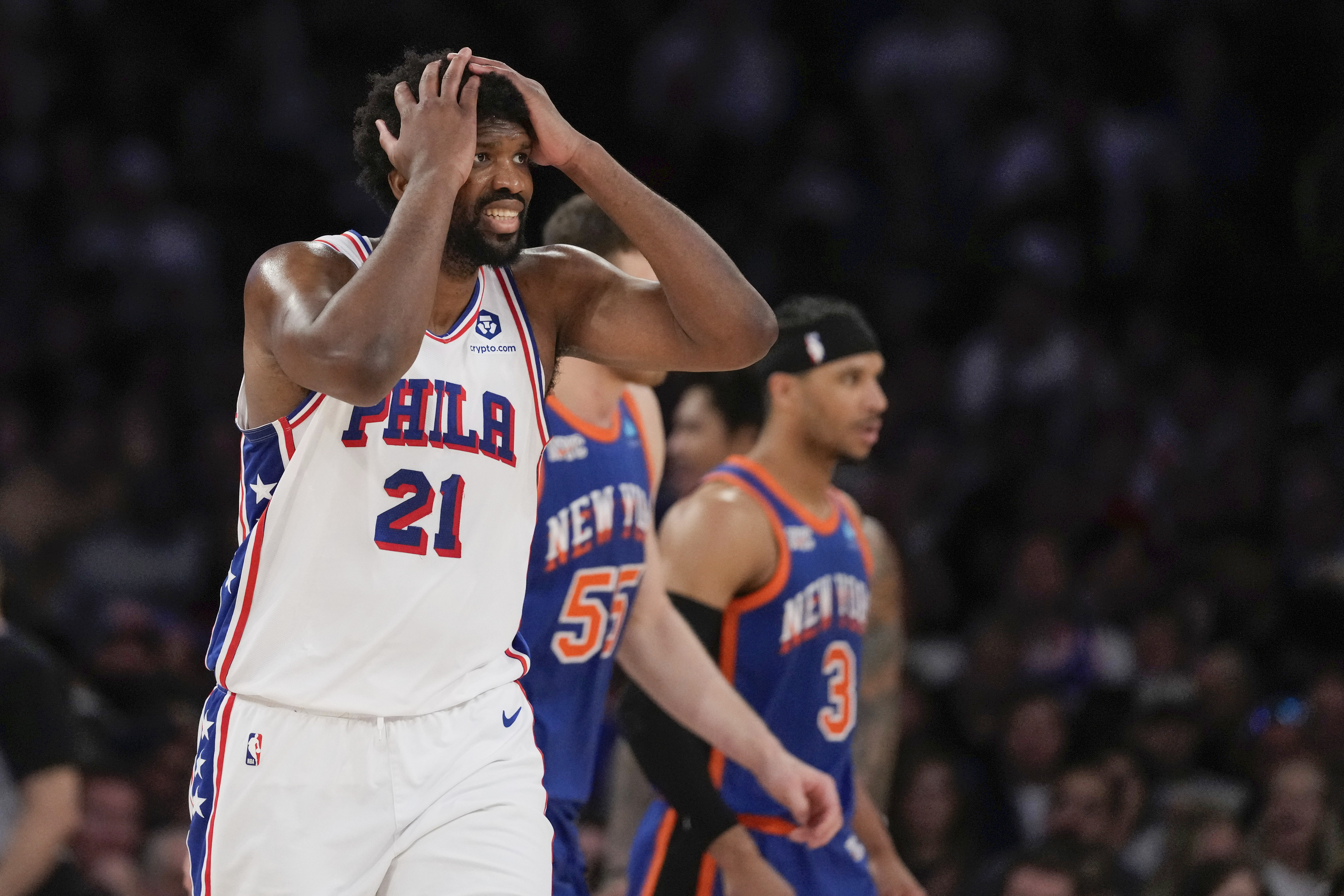 Philadelphia 76ers' Joel Embiid (21) reacts after a turnover during the second half of Game 5 in an NBA basketball first-round playoff series against the New York Knicks, Tuesday, April 30, 2024, in New York.