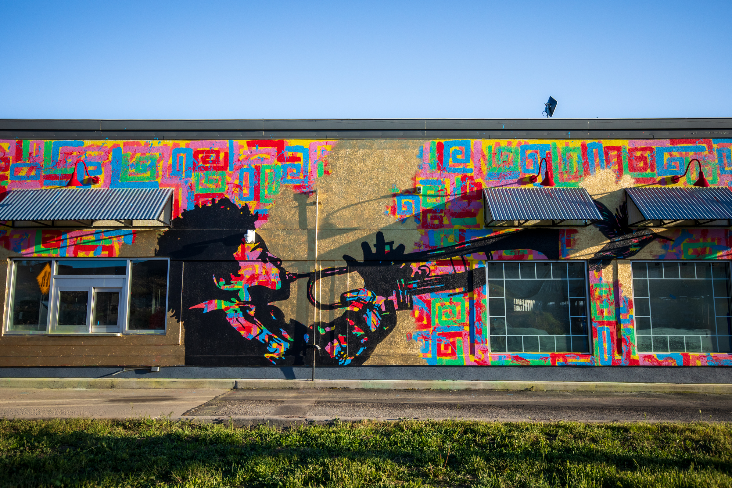 A section of Egypt Hagen's "Little Boy Blew" is painted on the side of an abandoned fast-food restaurant in South Salt Lake. It's one of 14 new murals that will be featured in this year's South Salt Lake Mural Fest.