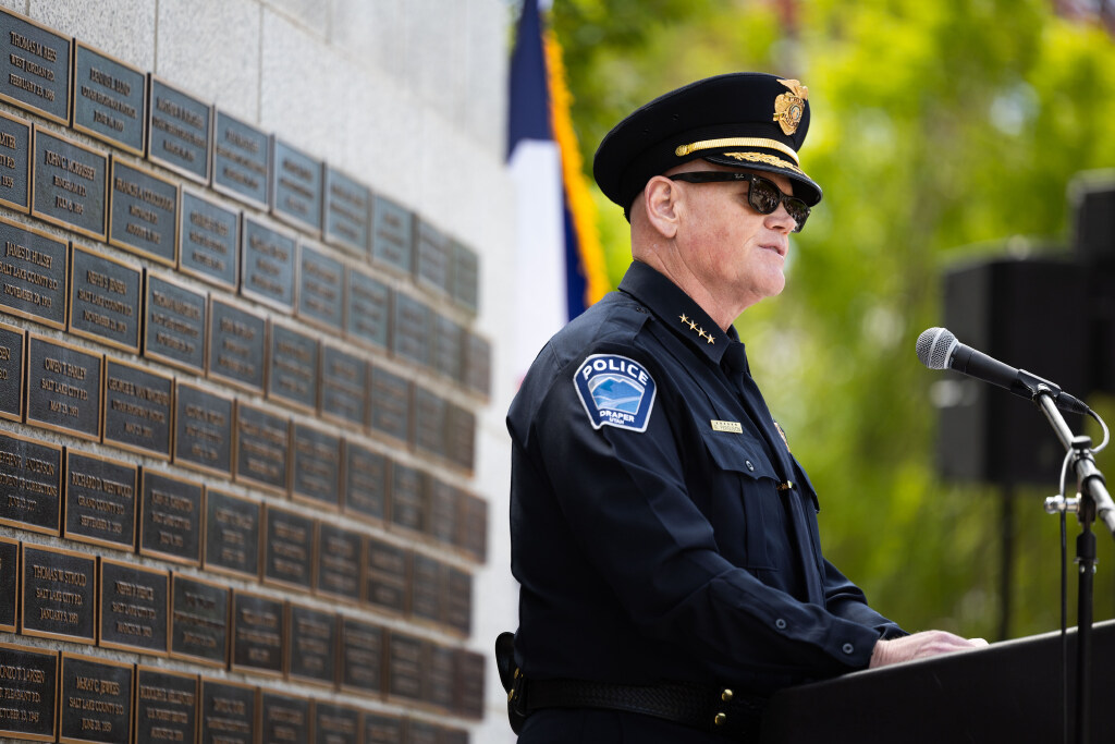 Draper Police Chief Rich Ferguson speaks about officer Trenton Halladay, whose name was added to the memorial wall, during a memorial service at the Utah Law Enforcement Memorial outside of the Utah Capitol in Salt Lake City on Thursday.