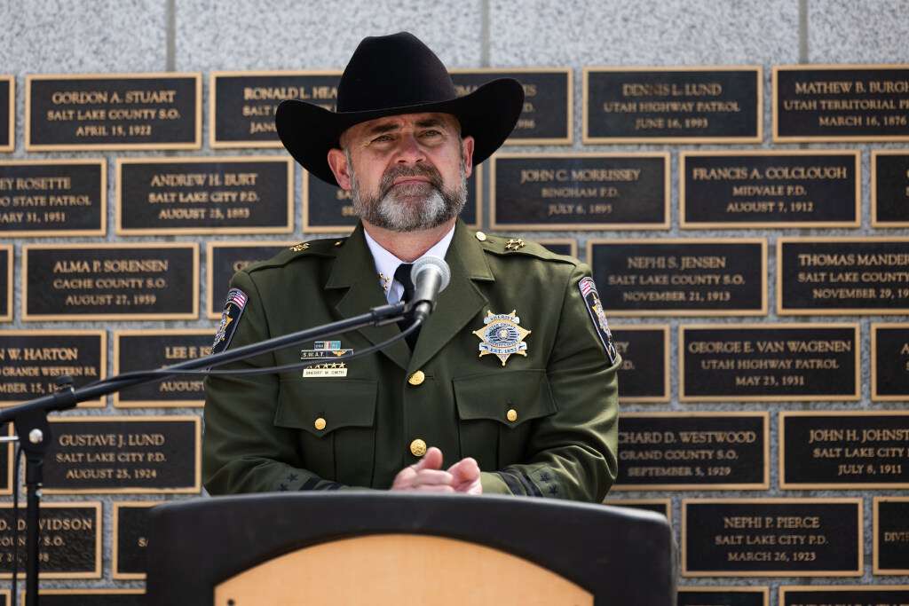 Utah County Sheriff Mike Smith speaks about deputy James Hand, whose name was added to the memorial wall, during a memorial service at the Utah Law Enforcement Memorial outside of the Utah Capitol in Salt Lake City on Thursday.