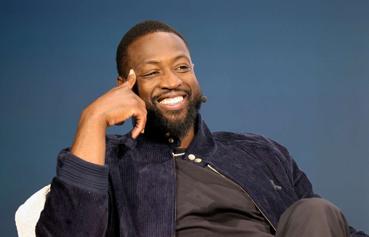 Dwyane Wade, former NBA player and Utah Jazz minority owner, speaks at the Qualtrics X4 Tech Summit at the Salt Palace Convention Center in Salt Lake City on Thursday.