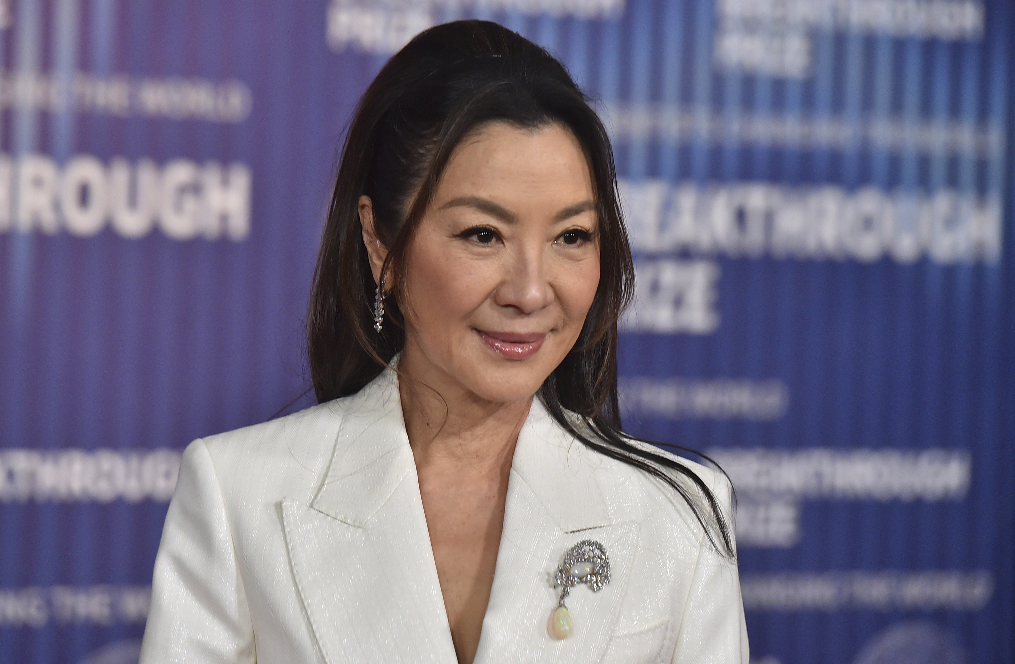 Michelle Yeoh arrives at the 10th Breakthrough Prize Ceremony on April 13, at the Academy Museum of Motion Pictures in Los Angeles. She is among 19 people receiving the  Presidential Medal of Freedom on Friday.