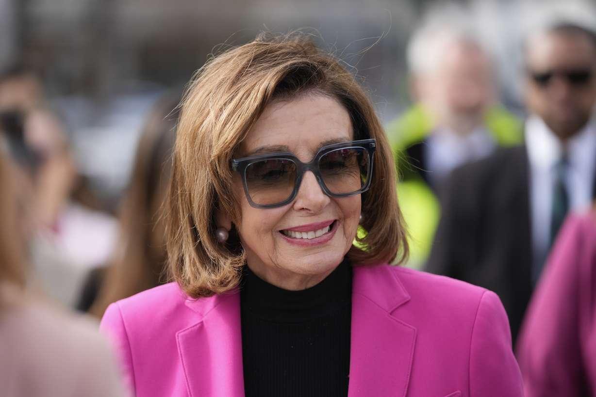 Speaker Emerita Nancy Pelosi walks to a news conference to address sea level rise along the city's waterfront in San Francisco, Jan. 26. She is one of 19 people receiving the Presidential Medal of Freedom on Friday.
