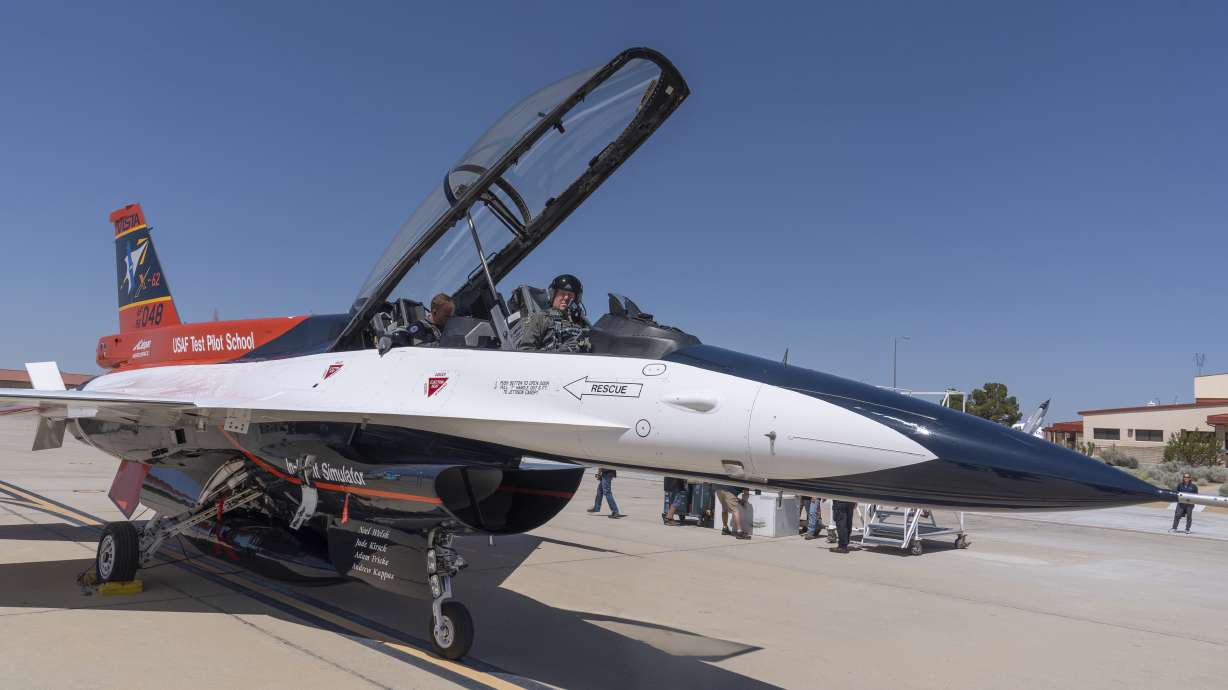 Air Force Secretary Frank Kendall sits in the front cockpit of an X-62A VISTA aircraft at Edwards Air Force Base, Calif., on Thursday. The flight of the modified F-16 was controlled by artificial intelligence.