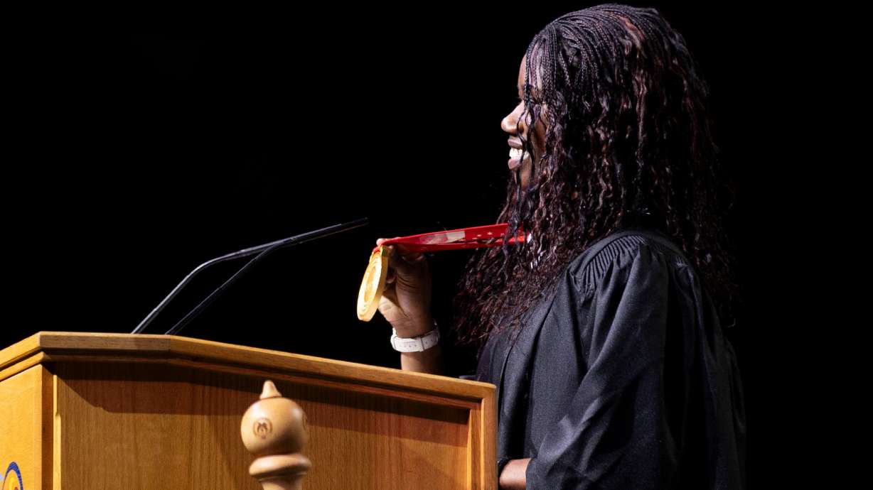 Olympic gold medalist and SLCC alumna Erin Jackson speaks during the Salt Lake Community College commencement ceremony at the Maverik Center in West Valley City on Friday.