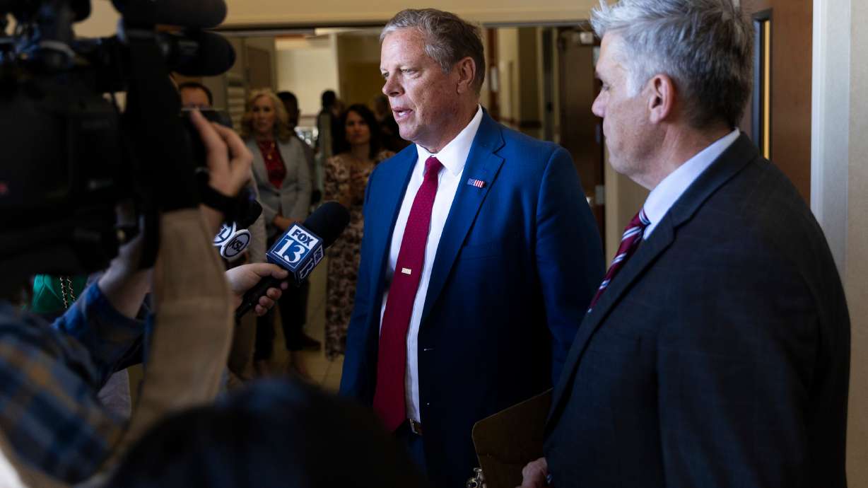 Layne Bangerter makes a statement after leaving the court room with gubernatorial candidate Phil Lyman at the Third District Court in West Jordan, on Friday. The judge said Bangerter is ineligible as Lyman's running mate.