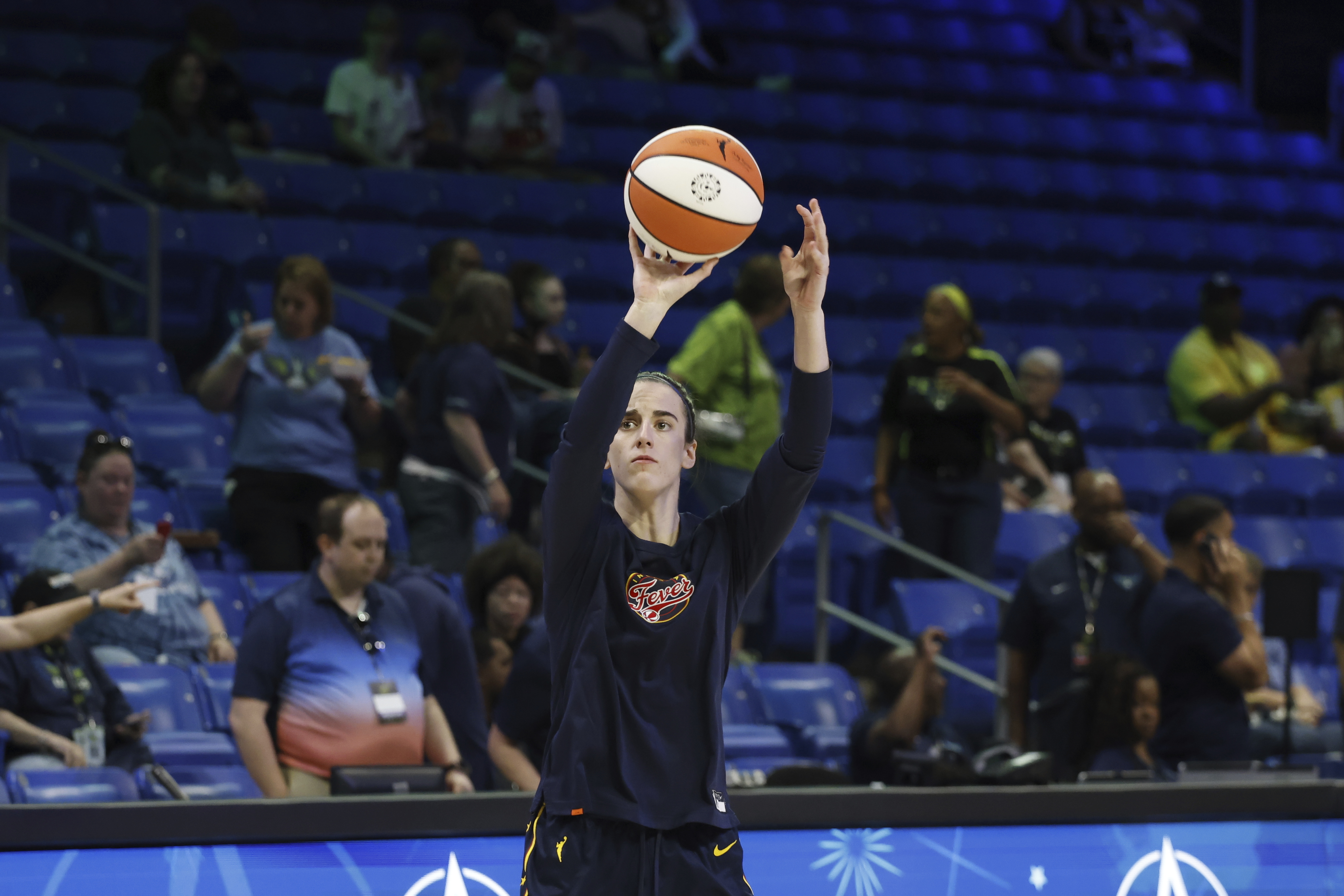 Indiana Fever guard Caitlyn Clark warms up prior to an WNBA basketball game against the Dallas Wings in Arlington, Texas, Friday, May 3, 2024.