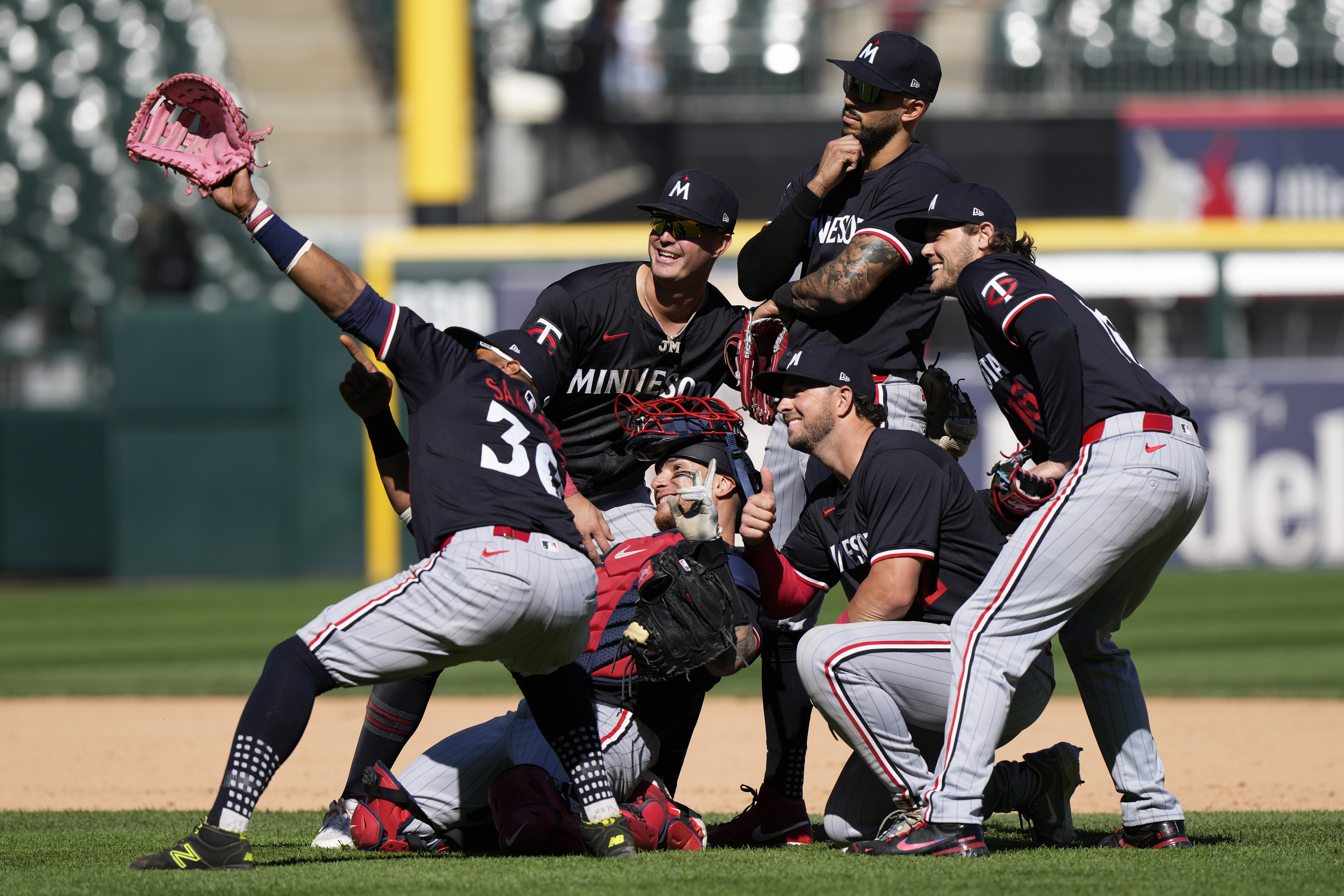 Minnesota Twins players celebrate after the Twins defeated the Chicago White Sox 10-5 in a baseball game in Chicago, Wednesday, May 1, 2024.