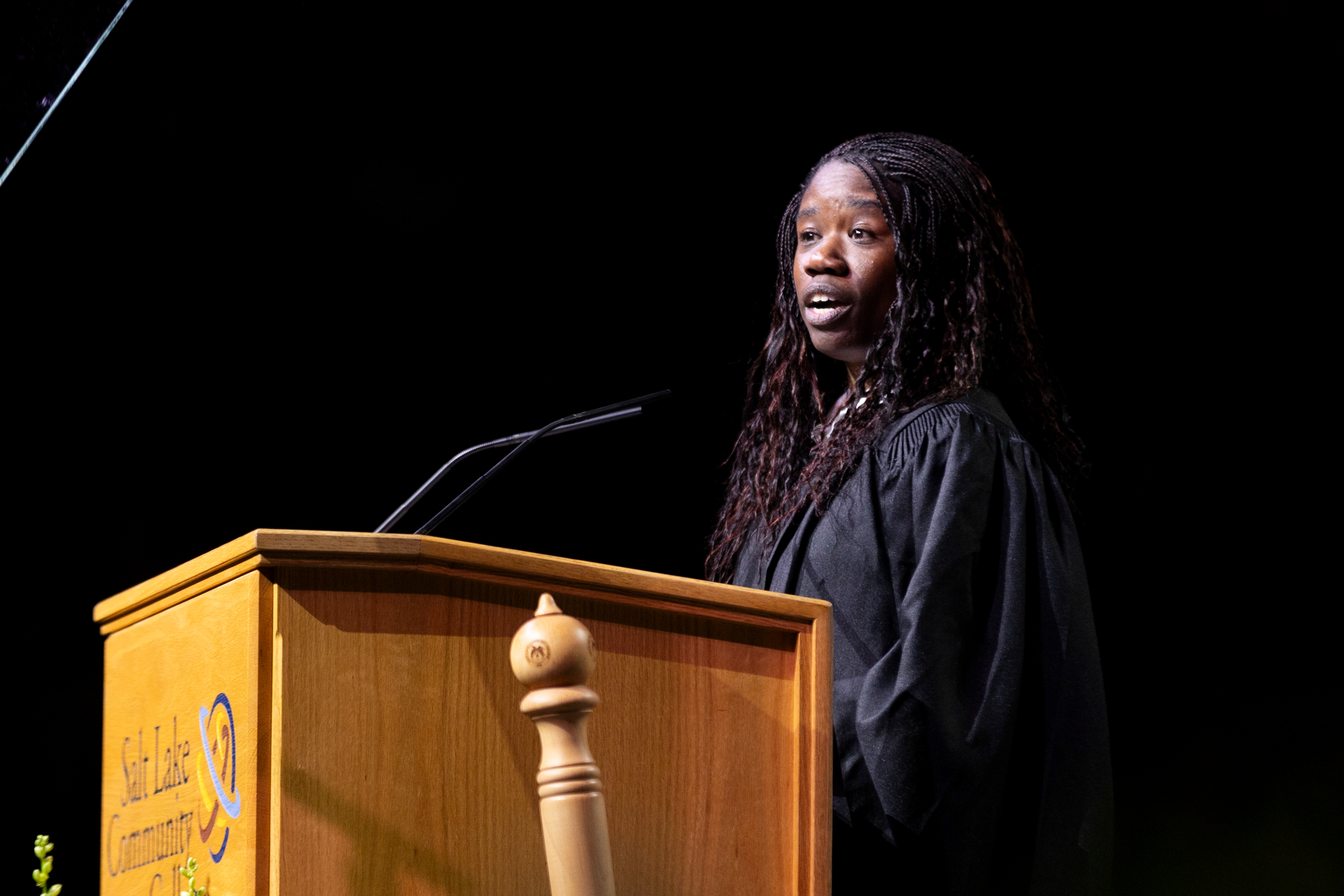 Olympic gold medalist and SLCC alumna Erin Jackson speaks during the Salt Lake Community College commencement ceremony at the Maverik Center in West Valley City on Friday.