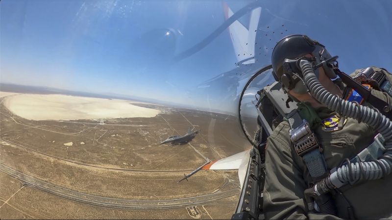 Air Force Secretary Frank Kendall is seen during his experimental flight inside the cockpit of a X-62A VISTA aircraft autonomous warplane above Edwards Air Base, Calif., on Thursday. 