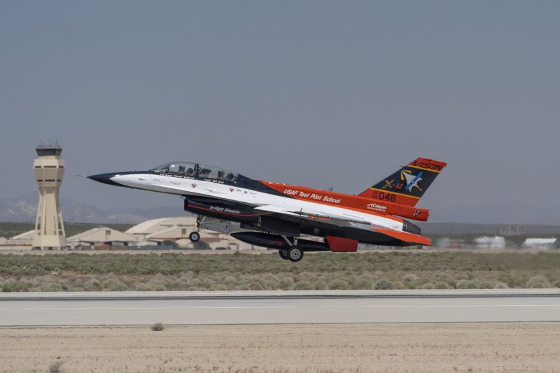 The X-62A VISTA aircraft, an experimental AI-enabled Air Force F-16 fighter jet, takes off on Thursday at Edwards Air Force Base, Calif. The flight is serving as a public statement of confidence in the future role of AI in air combat.